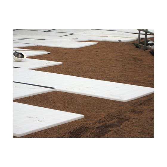 Plaque drainante pour moquette de pierre et gazon synthétique - Support alvéolaire extérieur : NIDAGREEN